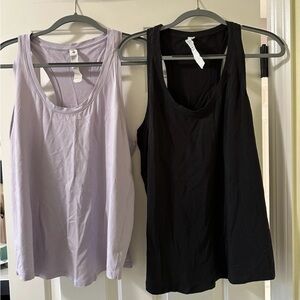 Two Lululemon designer athletic tank tops size 12